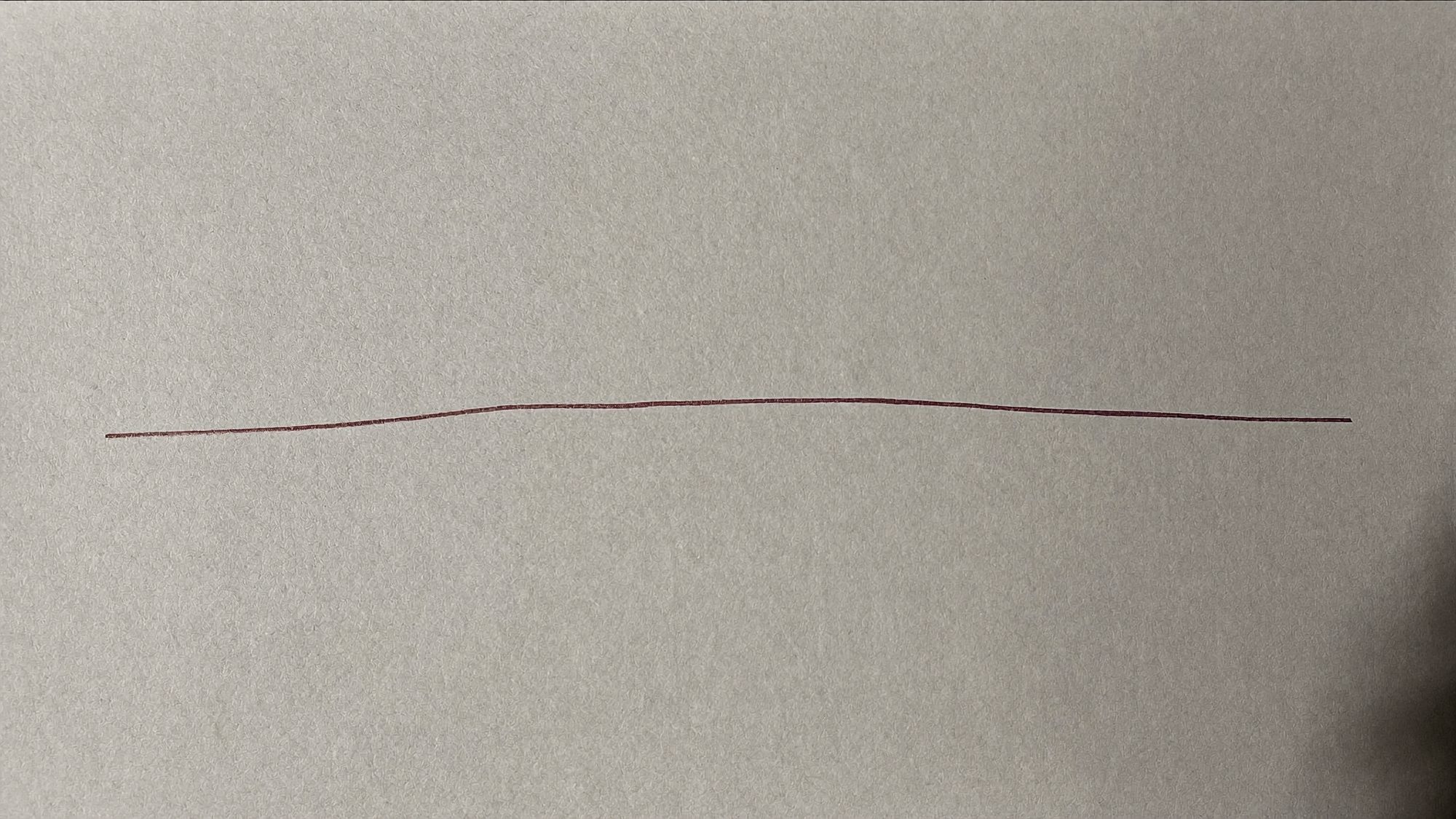 A single empty ruled line on cream paper